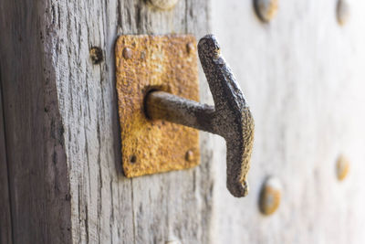 Close-up of rusty door latch
