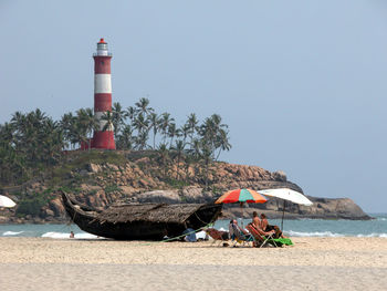 Scenic view of beach against clear sky