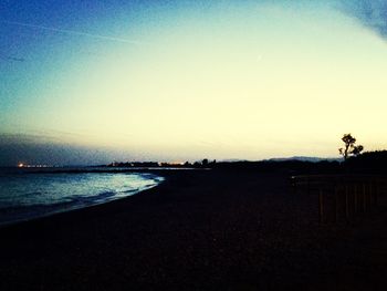 Scenic view of sea against sky at sunset