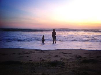 Scenic view of sea at sunset