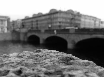 Bridge against sky in city