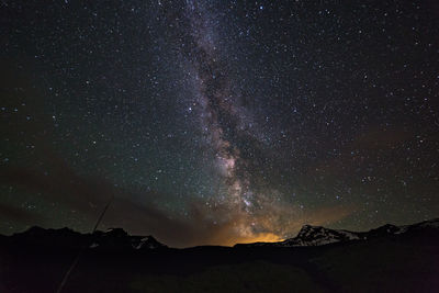 Scenic view of star field against sky at night