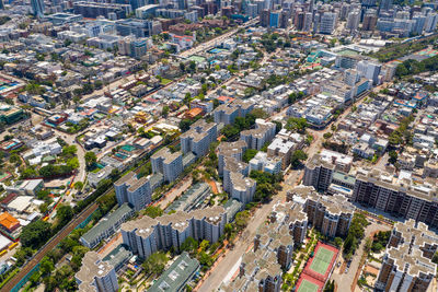 High angle view of street amidst buildings in city