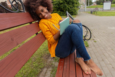 Woman sitting on bench