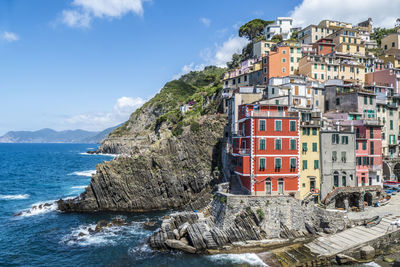 The beautiful riomaggiore in cinque terre with many colorful houses