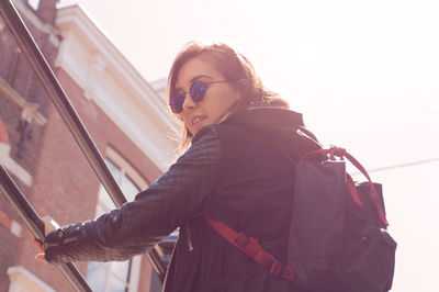 Low angle view of young woman