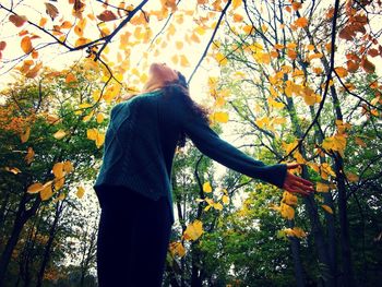 Woman in autumn park