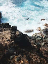 High angle view of rocks on beach