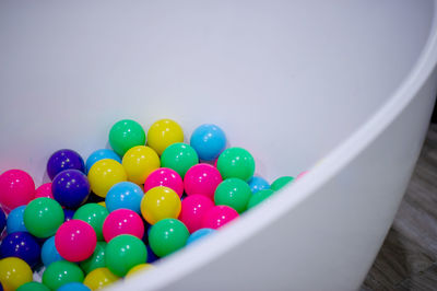 High angle view of multi colored balls on table