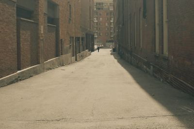 Narrow alley along buildings