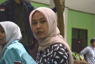 Portrait of young woman in hijab