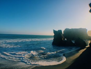 Scenic view of sea against clear sky