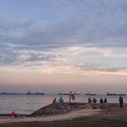 Scenic view of sea at sunset