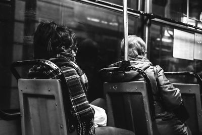 Women sitting in bus at night