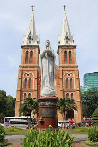 View of bell tower against cloudy sky