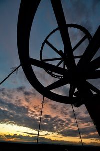 Low angle view of silhouette against sky