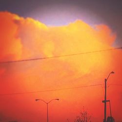 Low angle view of street light against sky at night