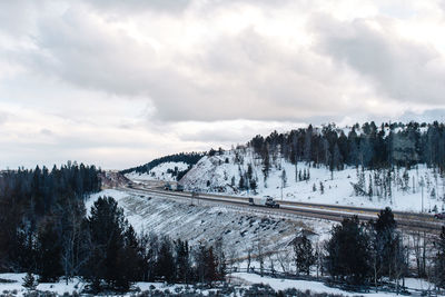 Scenic view of snow covered mountain against sky