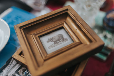 Close-up of picture frame at market stall