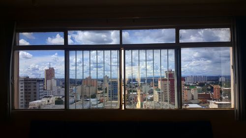 Cityscape seen through glass window