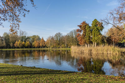 Scenic view of lake against sky during autumn