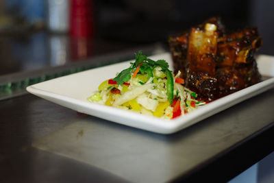 Close-up of served food in plate