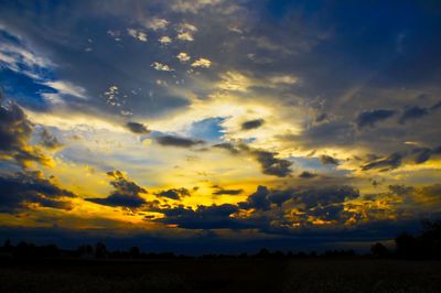 Scenic view of silhouette landscape against sky during sunset