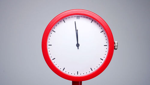 Close-up of clock against white background