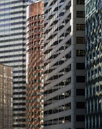 Low angle view of modern buildings in city