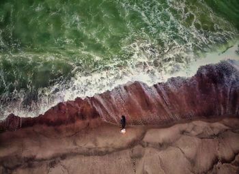 High angle view of man surfing in sea