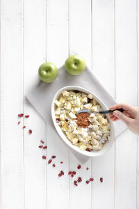 Directly above shot of person holding breakfast