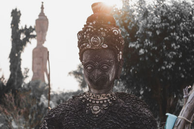 Close-up of statue against sky