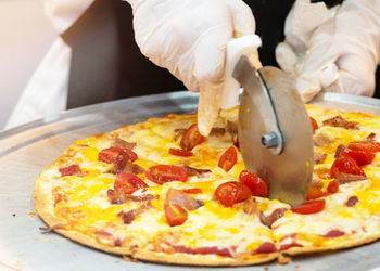 Midsection of person preparing food