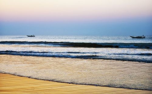 Scenic view of beach during sunset