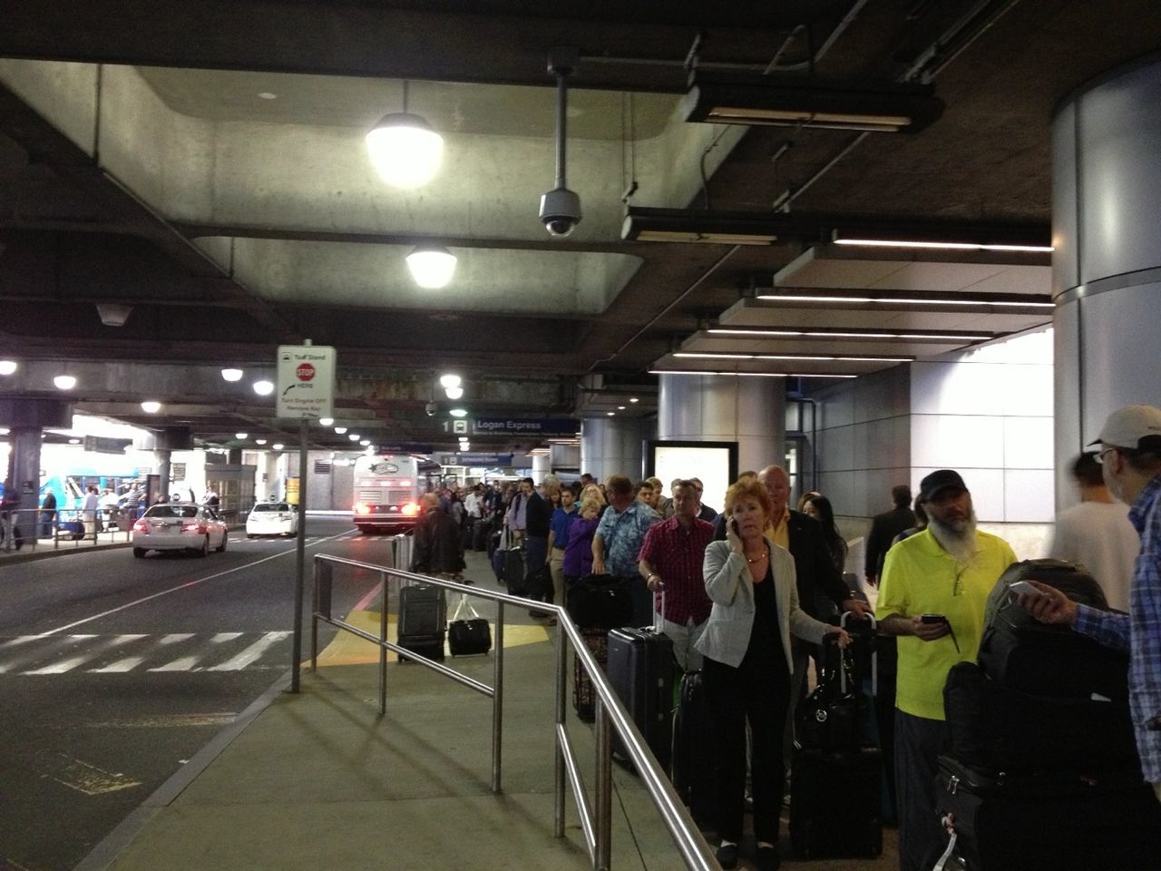 indoors, large group of people, men, person, public transportation, railroad station, lifestyles, transportation, illuminated, ceiling, subway station, passenger, architecture, built structure, city life, railroad station platform, travel, walking, medium group of people