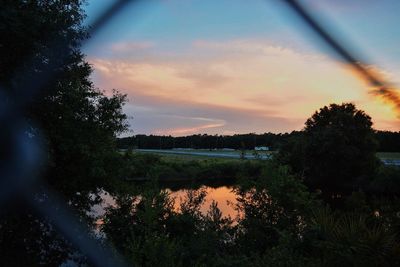 Scenic view of landscape against sky during sunset