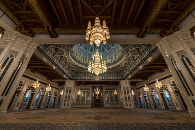 Illuminated chandelier in building