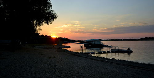 Scenic view of sea at sunset