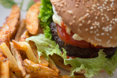 Close-up of hamburger with french fries