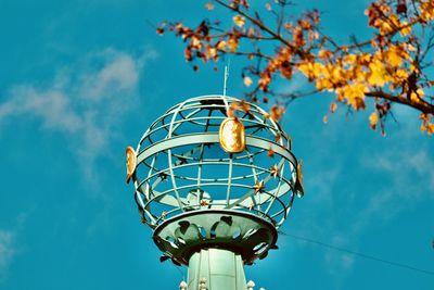 Low angle view of street light against sky