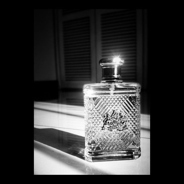 indoors, table, glass - material, home interior, window, illuminated, transparent, still life, close-up, no people, lighting equipment, electricity, dark, electric lamp, lit, absence, glowing, focus on foreground, candle, food and drink