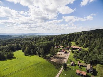 High angle shot of trees on landscape against sky