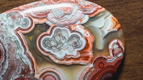High angle view of ornate carving on wood