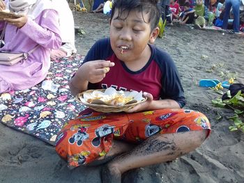 Full length of a man holding food