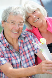 Portrait of senior couple at resort