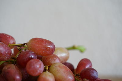 Close-up of grapes on table
