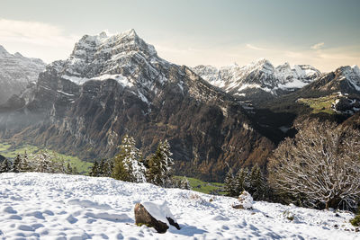 Snow covered mountain against sky