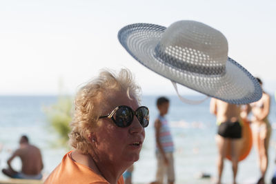 Woman with sunglasses at beach