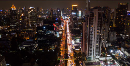 High angle view of illuminated buildings at night