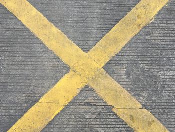 High angle view of yellow zebra crossing